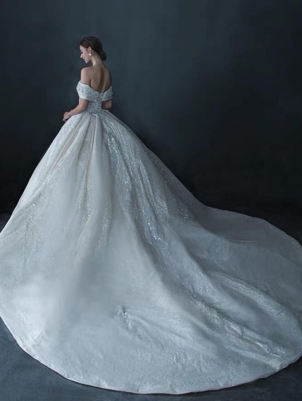 Luxurious Off-the-Shoulder Sparkling White Gown Wedding Dress with Train